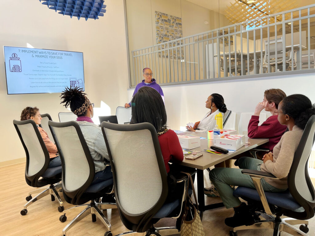 A group of coworking members in a conference room