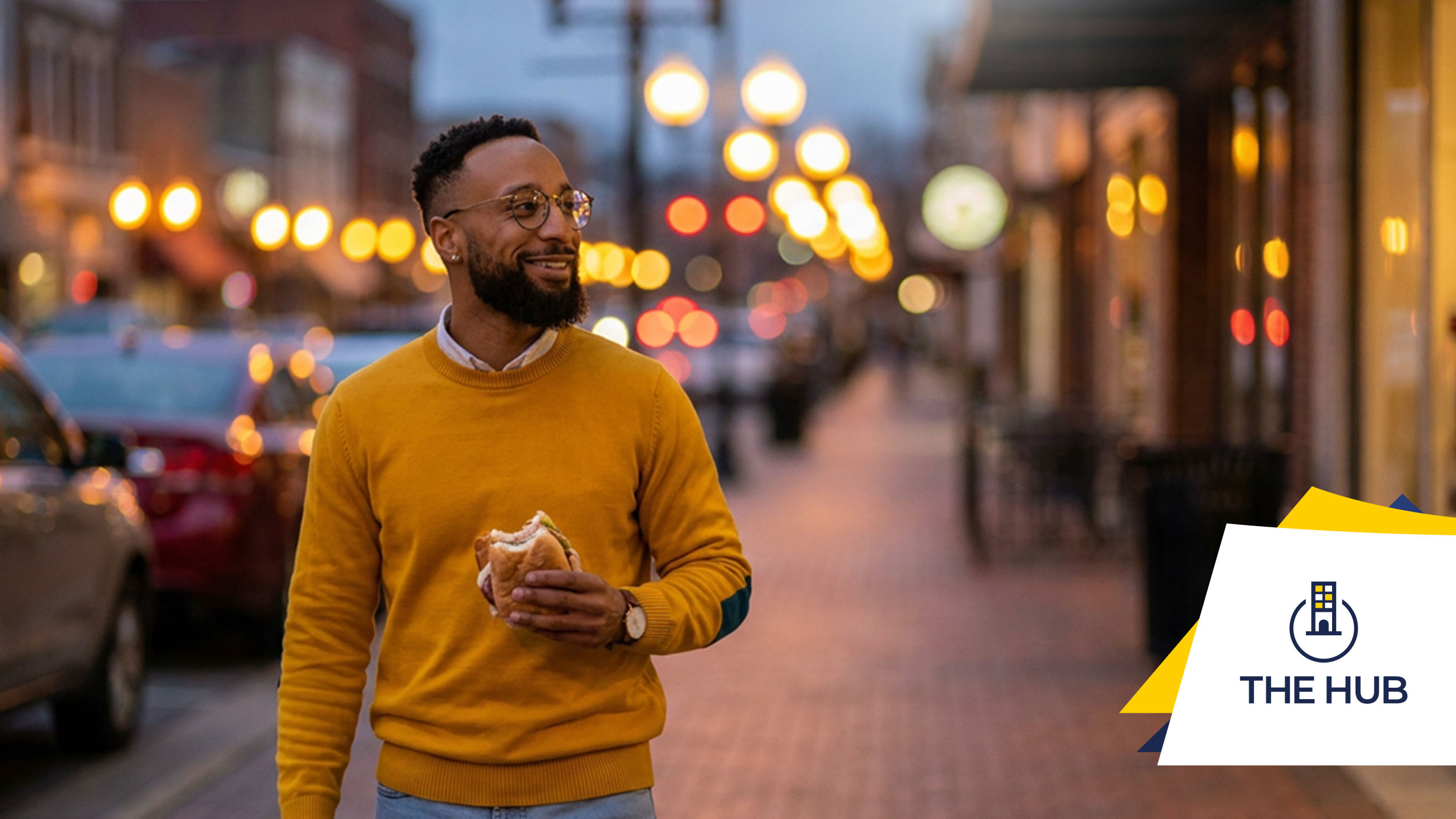 Digital nomad eating a sandwich in downtown Fayetteville, NC